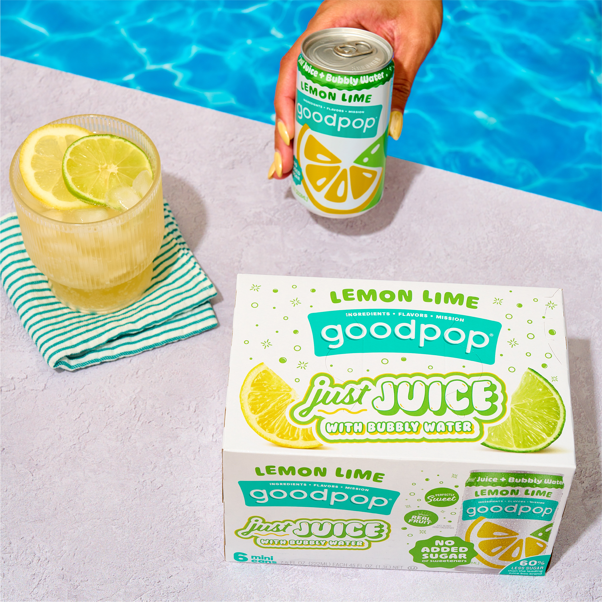 Woman enjoys GoodPop Lemon Lime Mini Cans pool side