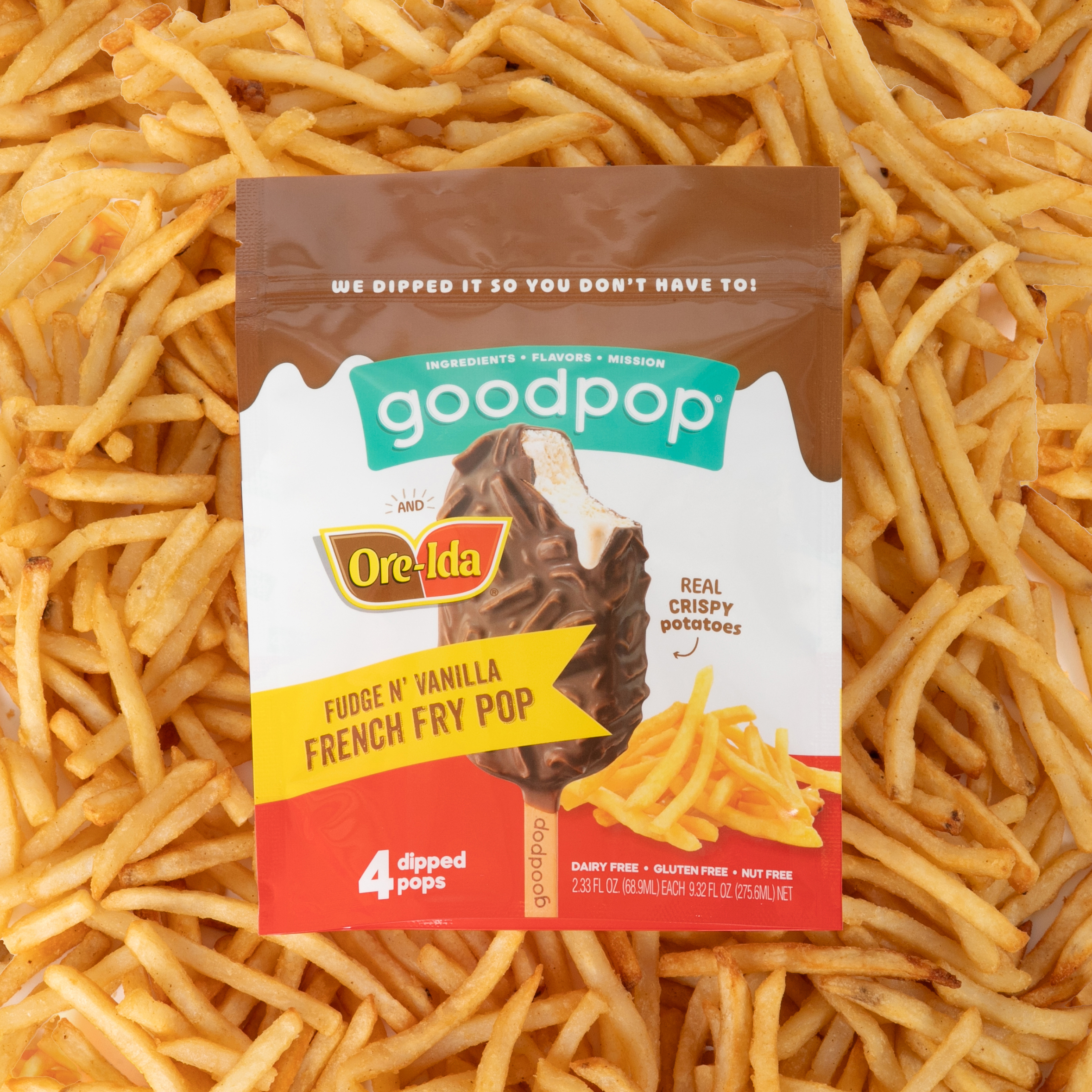 GoodPop x Ore-Ida Fudge n' Vanilla French Fry Pop bag lays on a bed of crispy french fries